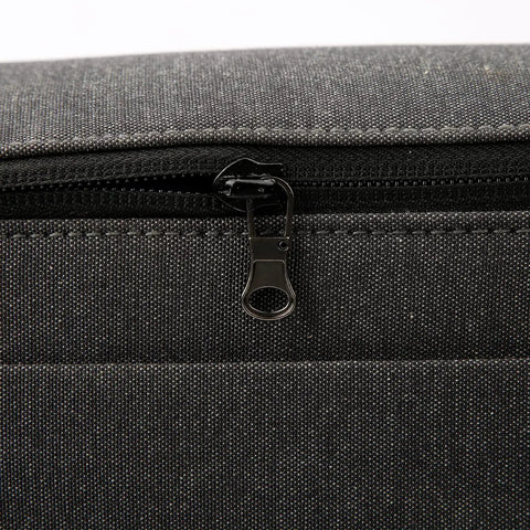 Close-up of dark gray zipper tab from Six Pack Detachable Zipper Pulls Replacement Kit For Jackets Pants Coats Shoes Suitcases And Backpacks Durable Dark Gray Zipper Tabs For Quick Repairs And Easy DIY Fixes on fabric surface.