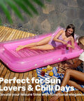 Two women relaxing with drinks on Inflatable Tanning Pool Lounger With Pillow 70 By 46 Inches Personal Water Filled Float in pink