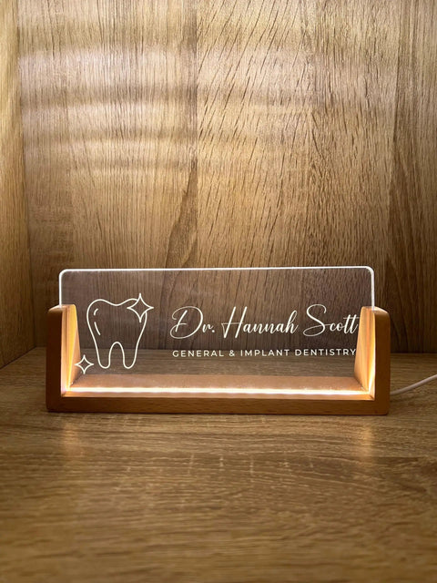 Custom Name And Title Desk Name Plate With LED Light Wood Holder For Dentist Doctor Hygienist Nurse Front Desk Sign Plaque Custom Engraving For Office Decor And Pro Gift featuring engraved dental logo and name on acrylic with wood base