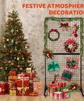 Two Pack Hella Durable Rolling Wire Grid Wall Panels Featuring Twenty Straight Up Sturdy Hooks For Retail Shops Craft Fairs Mobile Vendor Booths And Weekend Markets In Black displaying festive decorations and gifts.