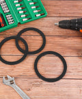 3 Inch Camlock Gasket Set, 5 Pack Buna N Seals For 3 Inch Cam And Groove Fittings, heavy duty gaskets next to tools on a table