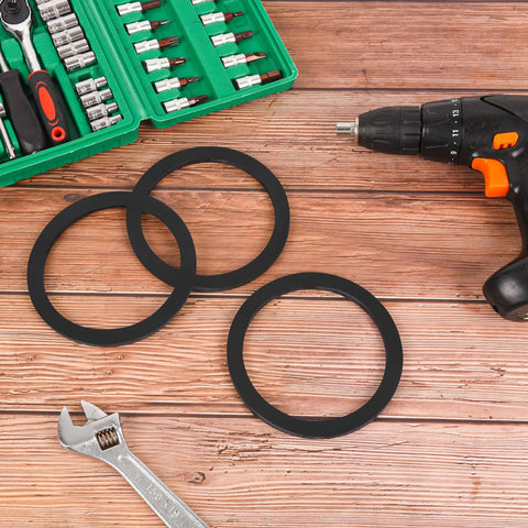 3 Inch Camlock Gasket Set, 5 Pack Buna N Seals For 3 Inch Cam And Groove Fittings, heavy duty gaskets next to tools on a table