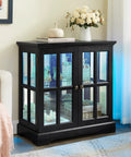 30 Inch Glass Curio Display Cabinet With LED Lighting Modern Two Lattice Doors in living room setting