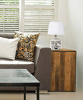 Welcome Home Rustic Ceramic Farmhouse Table Lamp With White Linen Shade on wood side table in modern living room.
