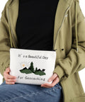 Person holding a Geocaching Makeup Bag For Outdoor Lovers It Is A Beautiful Day For Geocaching Gift Beige Durable Canvas Zip Bag