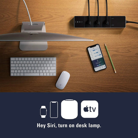 Desktop setup with Smart Triple Outlet Power Strip With Energy Meter for Apple HomeKit and Siri control next to phone