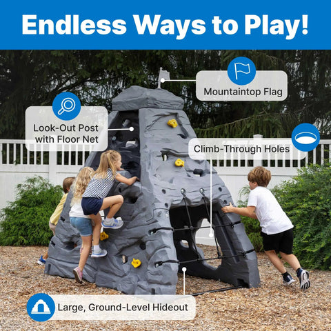 Kids playing on Skyward Summit Climbing Wall Playset For Kids Ages Four To Eight, 6.5 ft four-sided rock wall.