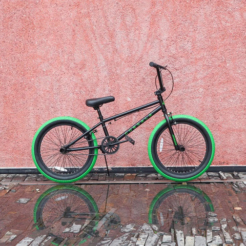 Freestyle BMX Bike For Kids 20 Inch Beginner Friendly Bicycle For Ages 7 To 13 With Durable Hi Ten Steel Frame Black With Green Tires