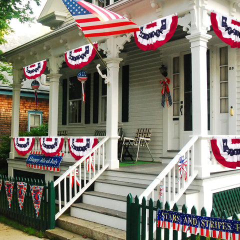Decorated porch with Three Piece Pleated Fan All American Flags Set 1.5x3 Ft Red White Blue Banners for 4th of July outdoor decor.