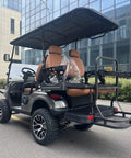 White 4 Seater Electric Golf Cart Featuring Flip Up Seats 48 Volt 150 Amp Hour Lithium Battery And Backup Camera side view in urban setting.