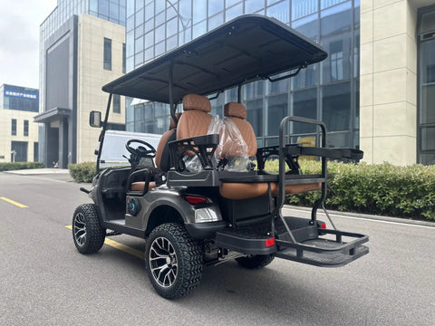 White 4 Seater Electric Golf Cart Featuring Flip Up Seats 48 Volt 150 Amp Hour Lithium Battery And Backup Camera side view in urban setting.