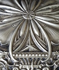 Close-up of Aged Silver 2X2 Ceiling Tiles Pack Of 10 For Drop-In Or Glue-Up Install PVC Panels with vintage tin floral design