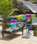 Simone Blue Tropical Outdoor Chaise Cushion 21 In W X 72 In L Weatherproof Rainproof Fade Resistant Patio Pad on chaise by poolside