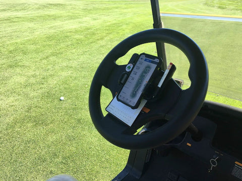 Golf Cart Steering Wheel Phone Mount Pro With Spring Loaded Arms And Scorecard Holder on steering wheel in use