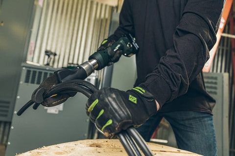 Kickass Heavy Duty Cable Cutter in use, cutting wire with electric tool, showcasing handle and safety features.