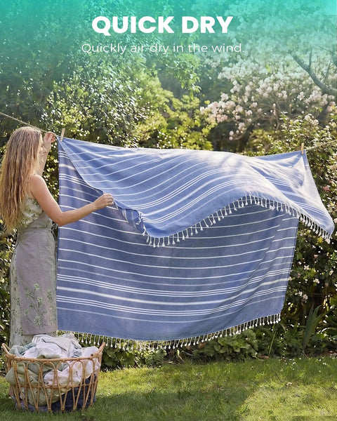 Woman holding Oversized Boho Turkish Beach Towel Blanket Quick Dry Sand Free Jumbo Outdoor Picnic Mat Extra Large XL Navy