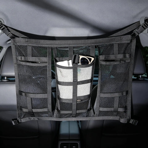 Ceiling Cargo Net With 3 Pockets And Double Layer Mesh Overhead Storage Organizer for cars and SUVs, installed on vehicle roof