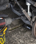 Mechanic using Beefy Four Piece Half Inch Drive Impact Extension Set With 3, 5, 10, 15 Inch Lengths For Heavy Duty Projects