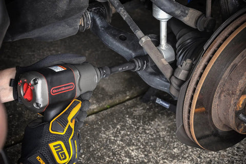 Mechanic using Beefy Four Piece Half Inch Drive Impact Extension Set With 3, 5, 10, 15 Inch Lengths For Heavy Duty Projects