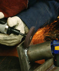 Heavy Duty Pneumatic Die Grinder With 1 Hp Motor And 8000 RPM Straight Shaft in use on metal, sparks flying, precise grinding job.