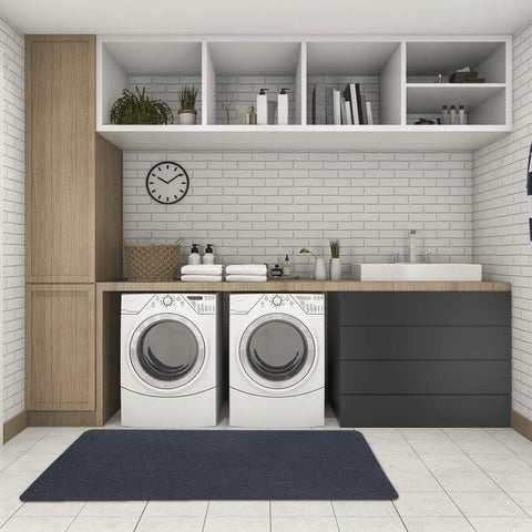 Laundry room with white brick walls featuring a black Multi Purpose Recycled Rubber Floor Mat For Indoor And Outdoor Use, 36 by 60.
