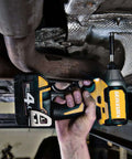 GEINXURN cordless impact driver with yellow and black body and magnetic bit holder, undercar view.