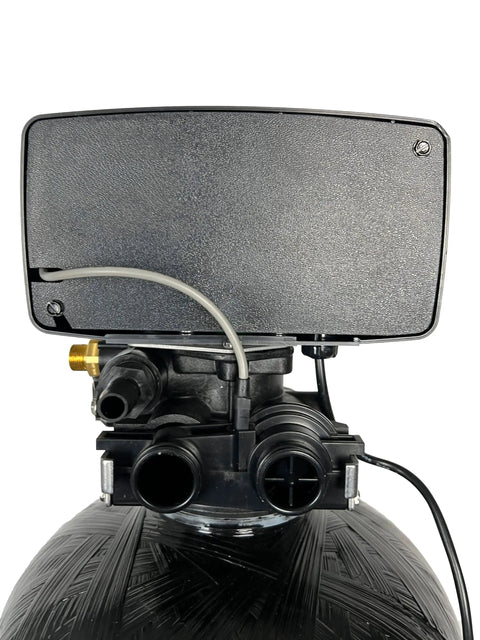 Back view of Fleck 5600SXT Metered Water Softener Valve With Digital Head And Battery Backup For On Demand Operation