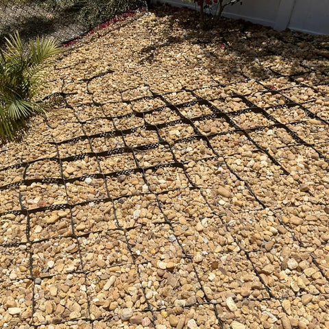 Gravel Grid HDPE Heavy Duty 4x33 Ft System With 2 Inch Depth And 1885 Lb Per Sq Ft Load Capacity installed in driveway