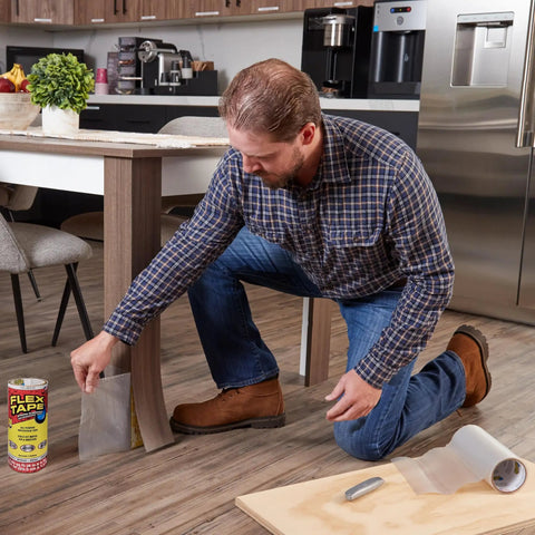 Person using Thick Rubberized Waterproof Tape For Patching Sealing Leaks And Quick Repairs That Works Underwater And On Dry Surfaces