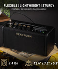 FRFR-GO Portable 30W Guitar Amp with dual 3 inch speakers, lightweight design, on a table with carry handle and controls visible.