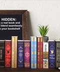 Bookshelf with various books including Discreet Bible Themed Diversion Safe With Real Pages 9.3 By 6.1 By 2.3 Inches Hidden Money Box