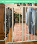 Stairway 46W Series Baby Gate for Stairs and Dog Gate Indoor With Door installed between banisters on a staircase