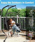 Woman and child sitting on Heavy Duty 700 Lb Double Egg Chair with Stand for Indoor or Outdoor Use, enjoying sunny garden view.