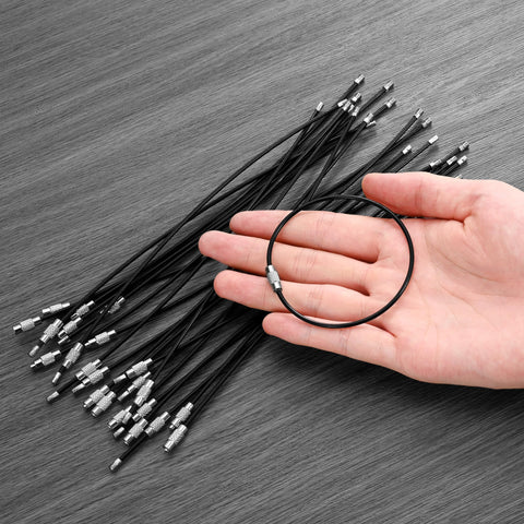 50 Pack Wire Keychain Cables Nylon Coated Stainless Steel Loop For Luggage Tags 2mm Thick 7.8 Inches Long Black, hand holding one