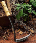Nejiri Kama Weeding Sickle Tool With Razor Sharp 4 Inch Drop Forged Blade for quick weed removal, wooden handle, in garden setting