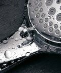 Close-up of Three Way Shower Combo With No-Drill Instant Mount Slide Bar, Overhead And Handheld Heads, stainless steel with water droplets.
