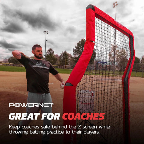 Portable Baseball Practice Net For Pitching And Hitting Pop Up Batting Cage With Coach Shield 7 Ft Z Screen Red in use.