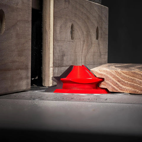 Two And Three Quarter Inch Lock Miter Bit With One Half Inch Shank Pro Grade shown in use creating 45 degree interlocking joints