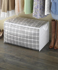 Zippered Jumbo Storage Bag With Clear Window Extra Large 34 Gallon Organizer in closet under hanging clothes with shoes nearby