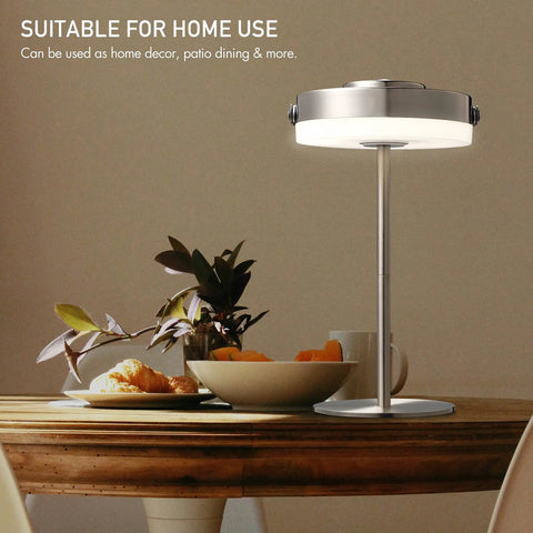 Portable LED Lantern With Built In Rechargeable Battery IP44 Water Resistant For Indoor And Outdoor Use on dining table