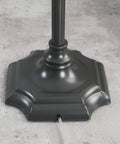 Base of Wentworth Swing Arm Floor Lamp in Burnished Bronze Finish with detailed design on a sturdy square base