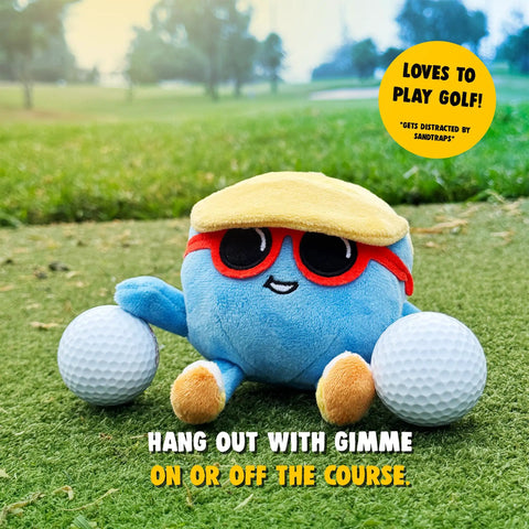 Ultra Soft 4 Inch Plush Golf Ball Toy With Gimme Character for fans, collectors, and golfers on a grassy field with golf balls