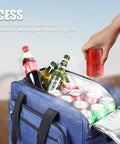 Portable Electric Cooler Bag With 12V Ac Dc Power And Dual Temperature Control has drinks inside and a hand holding a soda can.