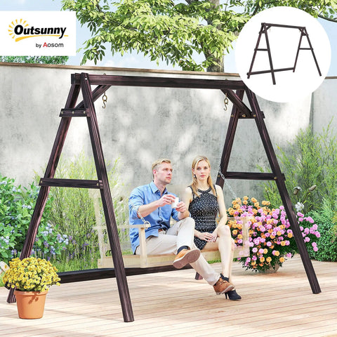 Outdoor setting with Heavy Duty A Frame Wooden Swing Stand With Reinforced Bars, supporting two people, carbonized finish.