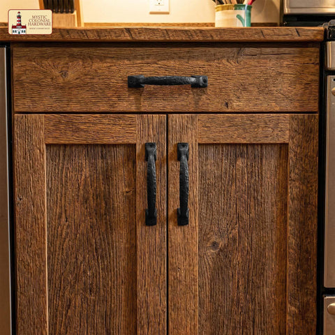 Twisted Grip Mystic Colonial Rustic 6.5 Inch Barn Door Handle Pull For Sliding Barn Doors Built Tough With Black Wrought Iron For Wooden Gates Garages Sheds And Farmhouse Furniture on a cabinet