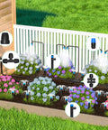230 Foot Quick Connect Drip Irrigation Kit With adjustable nozzles and sprinklers set up in a garden.