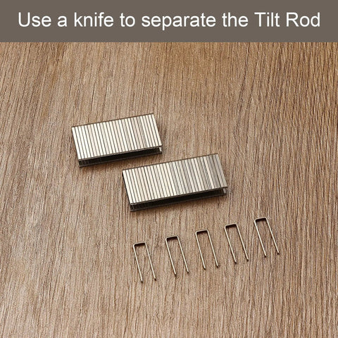 Forty Piece Zinc Plated Iron Louver Staple Kit For Standard Plantation Shutters Featuring Tough Rust Resistance And Straight Up Perfect Tilt Rod Alignment, showing zinc clips on wood background.