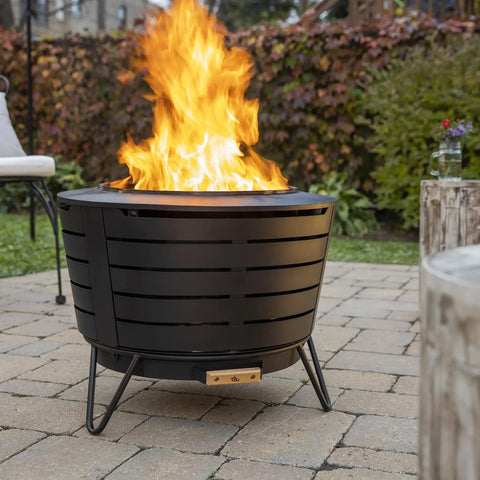 Smokeless 25 Inch Wood Burning Outdoor Fire Pit with Removable Ash Pan, Sturdy Stand on patio with flames