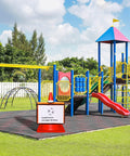 Playground with a cone in a Set Of Six Traffic Cone Sleeve Covers With Pockets For Caution Signs And Outdoor Safety Includes Orange Blue Green Red Purple Colors For Clear Visibility During Training And Events.