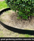 No Dig 4 Inch Landscape Edging Kit 33 Feet Long With 30 Spikes Flexible Garden Border installed around shrub